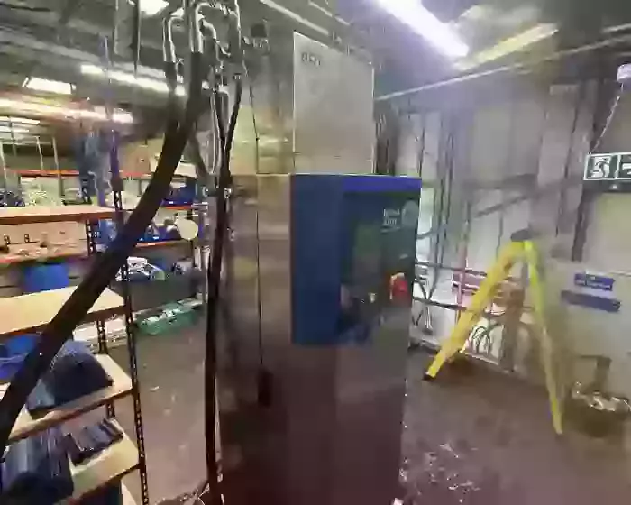 Upgraded Nilfisk multi-pump system in a food factory in Birmingham following installation of a 160 litre water tank and control components. The system now supports full demand during clean-down with improved reliability and consistent water supply.